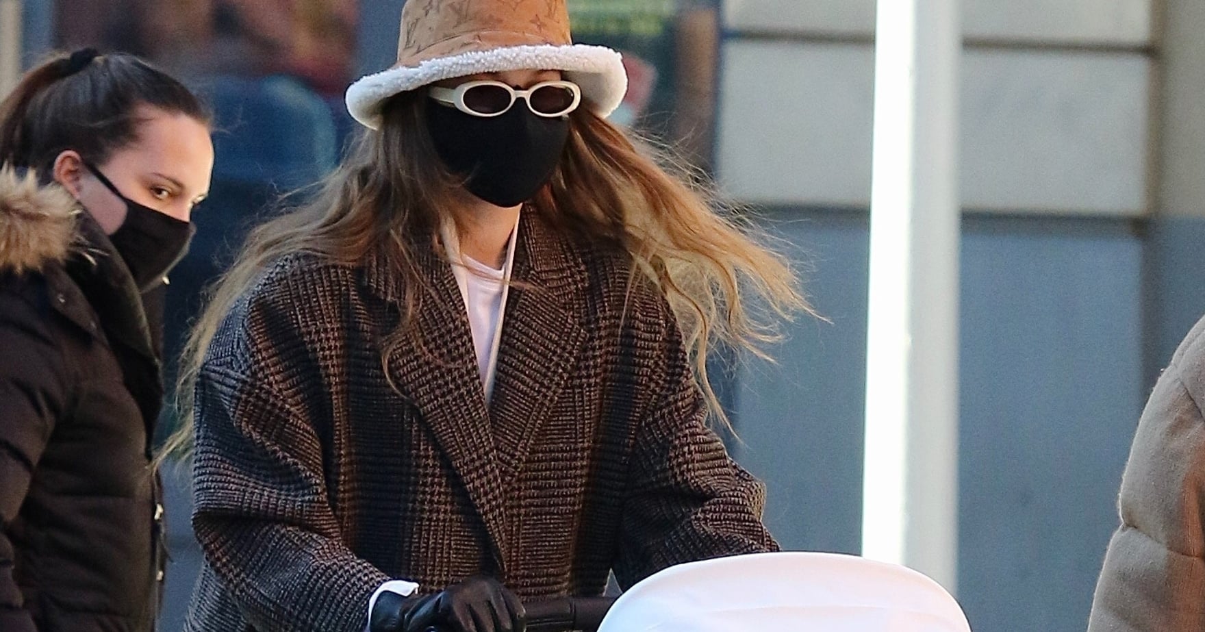 Shop Gigi Hadid s Mango Coat and Shearling LV Bucket Hat POPSUGAR Fashion