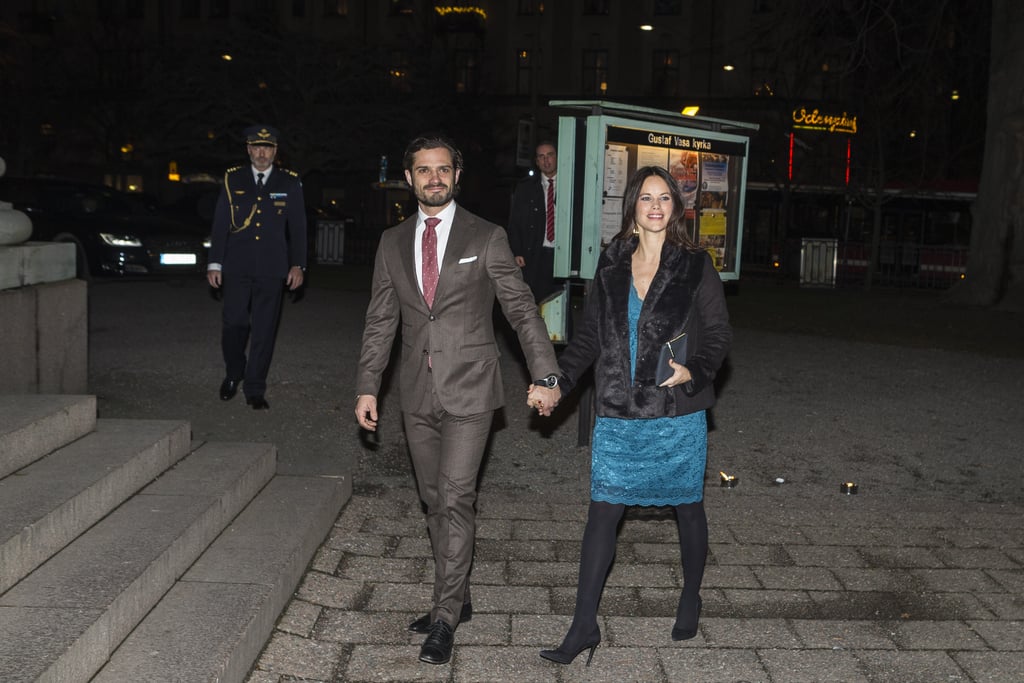 It's possible to be warm and still look good! The princess wore a fur-embellished coat over her dress and added a pair of basic black tights to fight the chill.