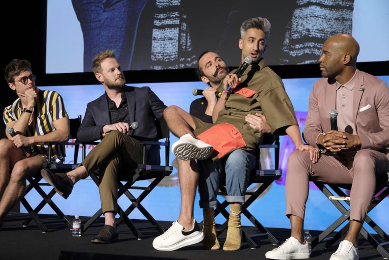 Tan Sat on Jonathan's Lap While Chatting on Stage