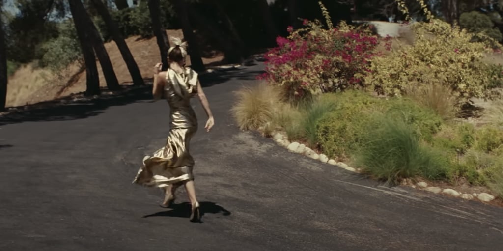 Miley Cyrus's Gold Dress in the "Flowers" Music Video