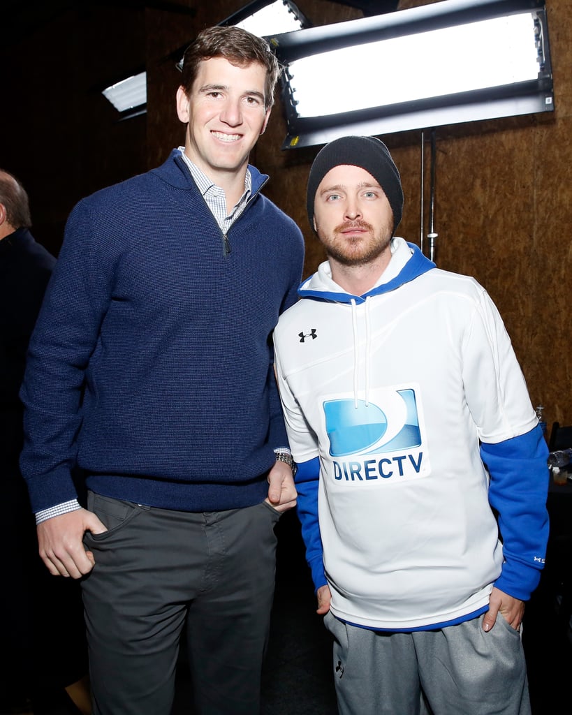 Eli Manning towered over Aaron Paul at the DirecTV Beach Bowl.