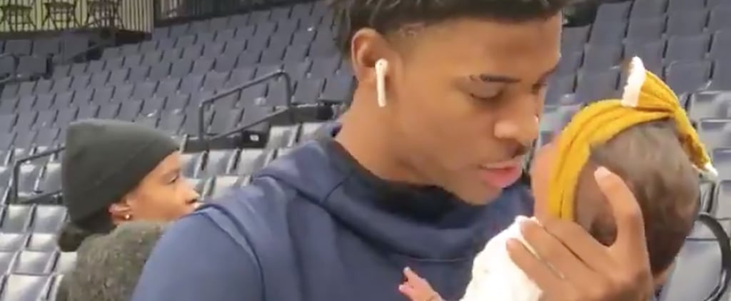Watch This NBA Rookie Cuddle His Daughter Before a Game