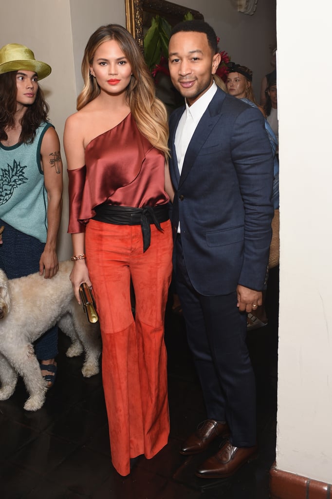 John Legend balanced Chrissy's red-hot look in a crisp blue suit.