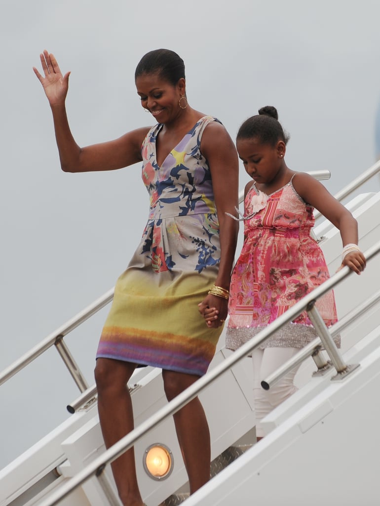 Michelle wearing a floral dress with a brushstroke effect in New Orleans.