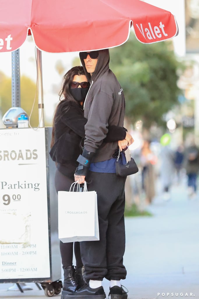 Kourtney Kardashian and Travis Barker seem totally smitten with each other. On Tuesday, the couple were seen cuddled up outside of Crossroads Kitchen in Los Angeles. Travis led the way for Kourtney as the valet brought their car over, and he made sure to open the door for her when it arrived. 
Travis and Kourtney have been friends for years, and it was only recently that their relationship turned romantic. During an appearance on The Drew Barrymore Show earlier this month, the Blink-182 drummer briefly opened up on his romance with Kourtney, calling her a great mom and friend. Both Kourtney and Travis have kids from previous relationships, and according to Travis, it's much easier for him to date someone with children because they understand what that's like. "It just comes natural," he said. Kourtney has three kids with ex Scott Disick: daughter Penelope, 8, and sons Mason, 11, and Reign, 6. Meanwhile, Travis shares stepdaughter Atiana, 21, daughter Alabama, 15, and son Landon, 17, with ex-wife Shanna Moakler.

    Related:

            
            
                                    
                            

            Keep Up With Over 10 Years&apos; Worth of Photos of the Kardashian-Jenner Family