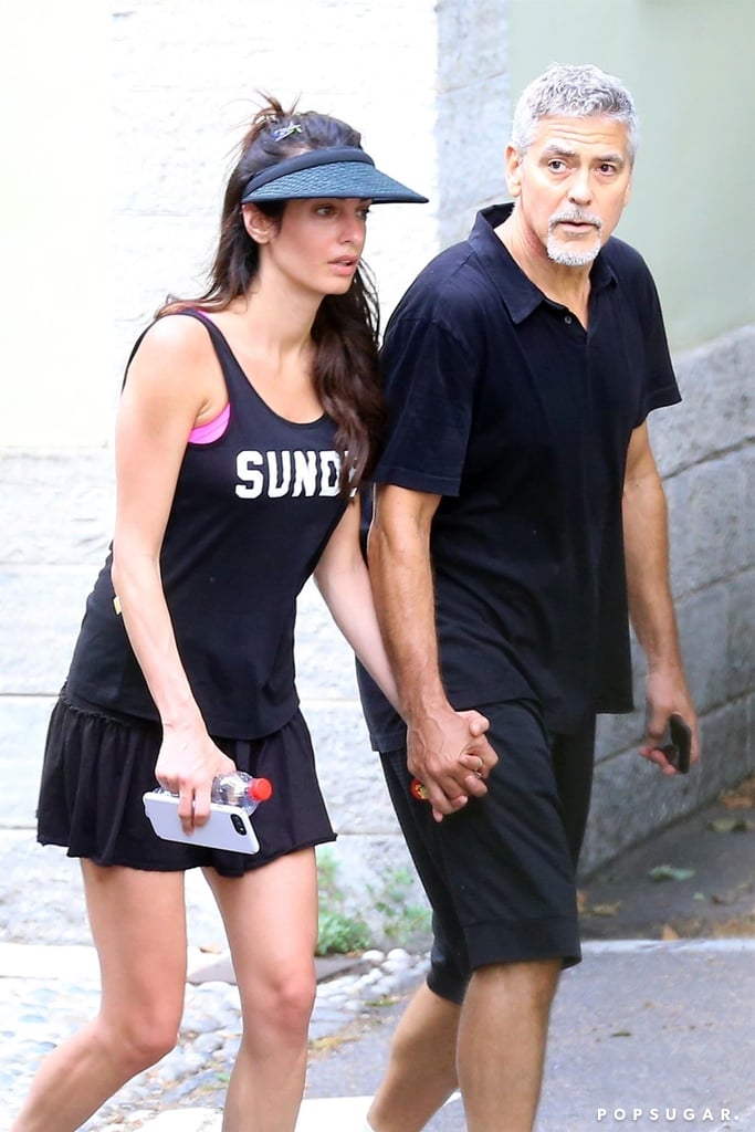 George and Amal in tennis dresses George-Amal-Clooney-Holding-Hands-After-Tennis-Pictures