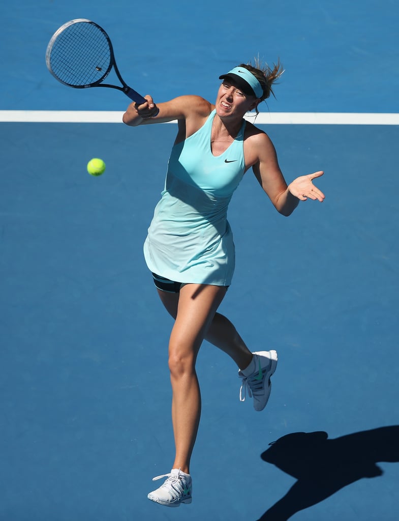 Maria Sharapova took a swing in a layered blue outfit at the 2014 Australian Open.