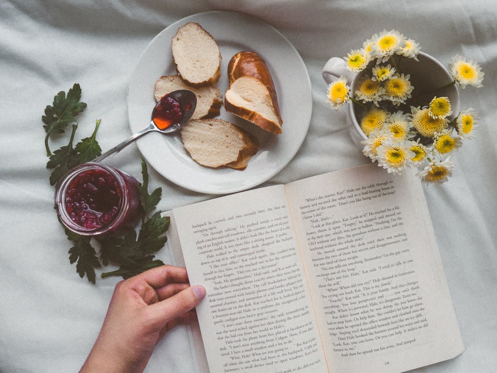 Eating while reading is totally acceptable for you. But sometimes you forget to eat because you're reading.