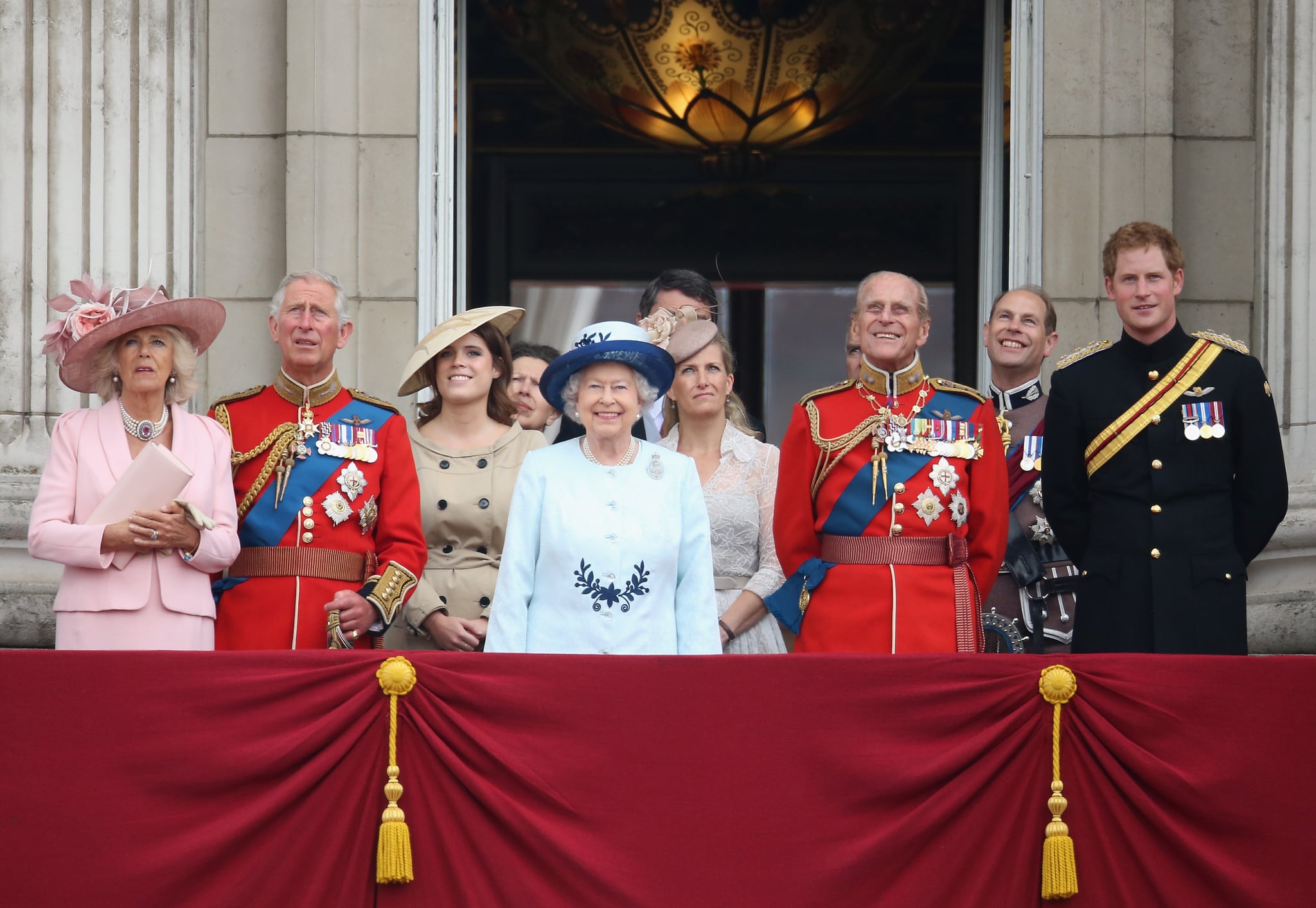 LONDON, ENGLAND - JUNE 14:  (L-R) Camilla, Duchess of Cornwall, Prince Charles, Prince of Wales, Princess Eugenie, Queen Elizabeth II, Sophie, Countess of Wessex, Prince Philip, Duke of Edinburgh, Prince Edward, Earl of Wessex and Prince Harry look on from the balcony during Trooping the Colour - Queen Elizabeth II's Birthday Parade, at The Royal Horseguards on June 14, 2014 in London, England.  (Photo by Chris Jackson/Getty Images)