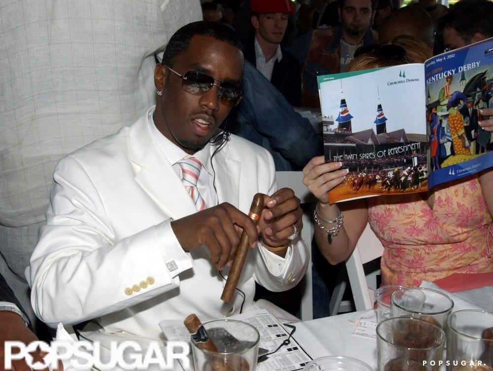 Diddy smoked a cigar during the 2001 races.