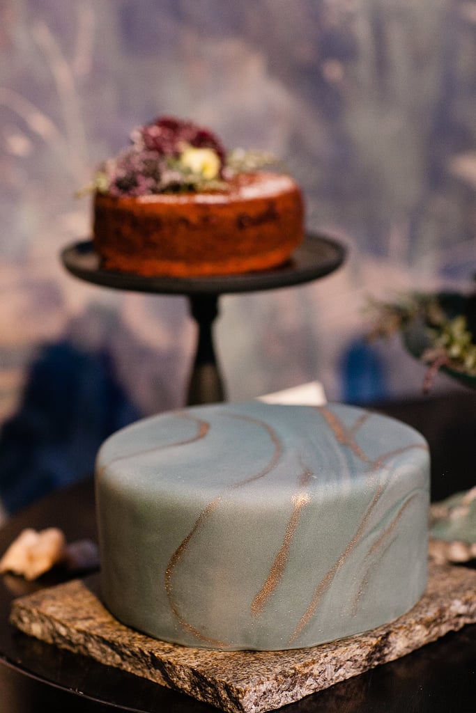 This cake combines both classic and modern elements with smooth marbled fondant and a hint of shine.