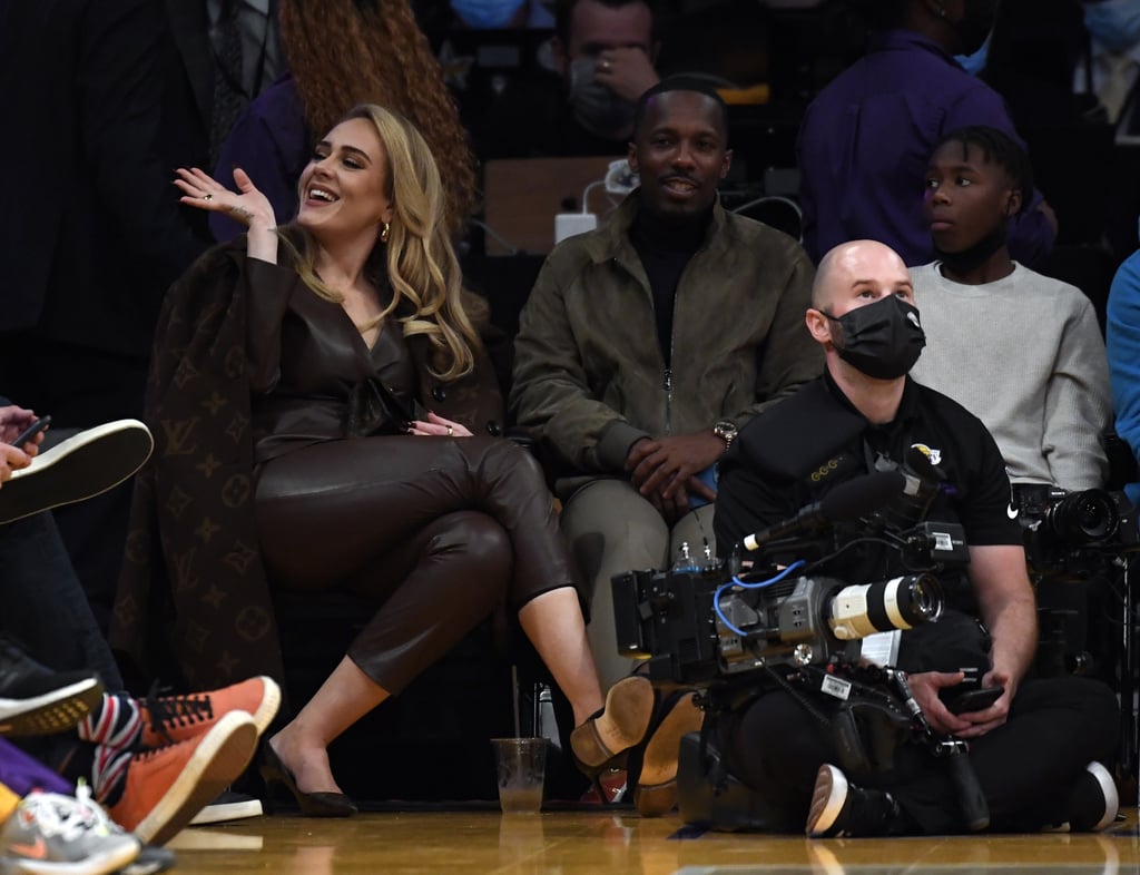 Adele Wears a Louis Vuitton Coat to the NBA Season Opener