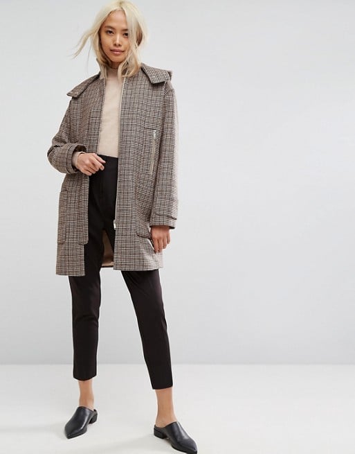 Channel your inner Brit chick in this ASOS Hooded Check Coat With Rib Funnel Neck ($135).