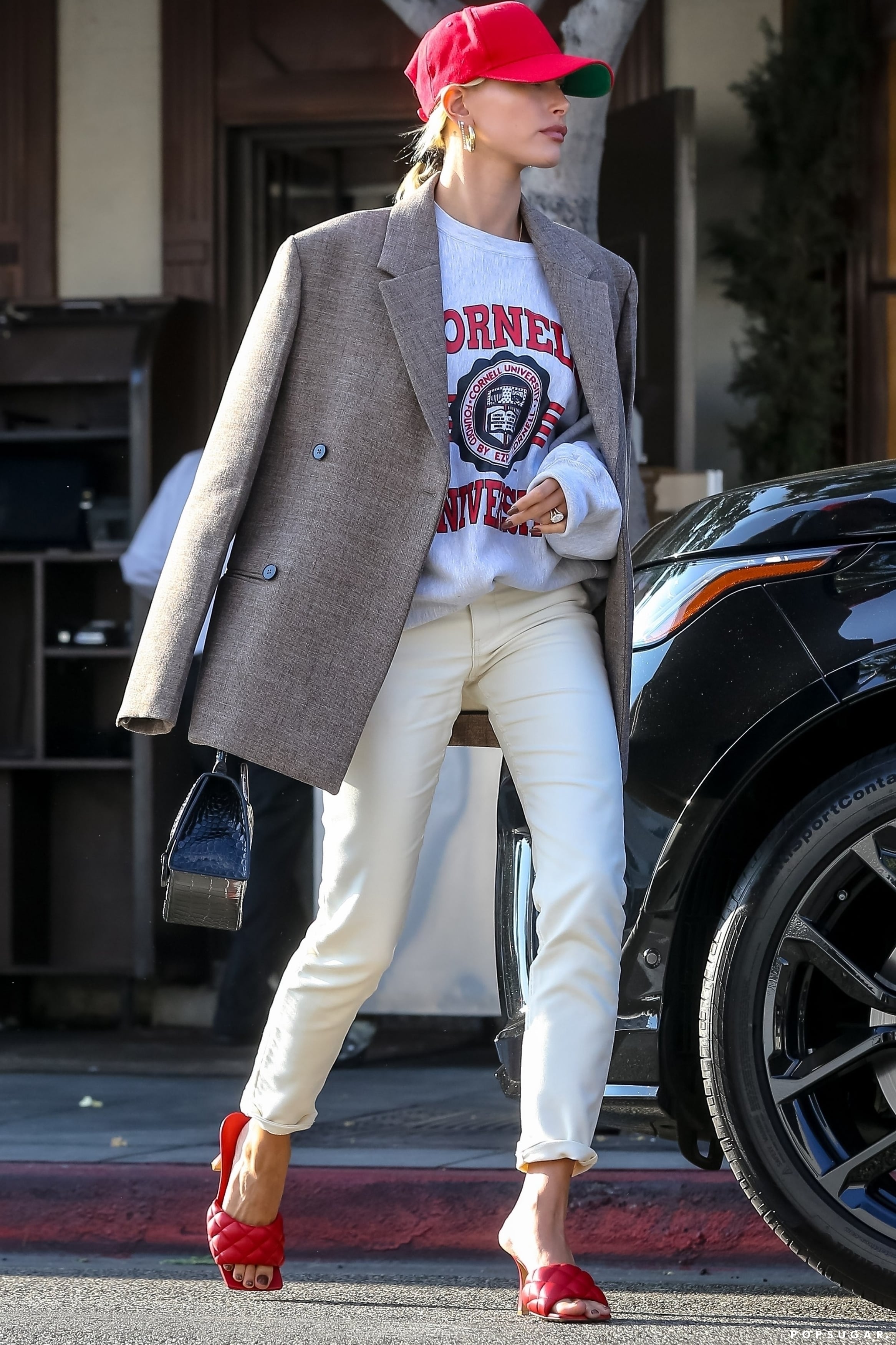 Shop Hailey Baldwin's Gucci Cardigan in White