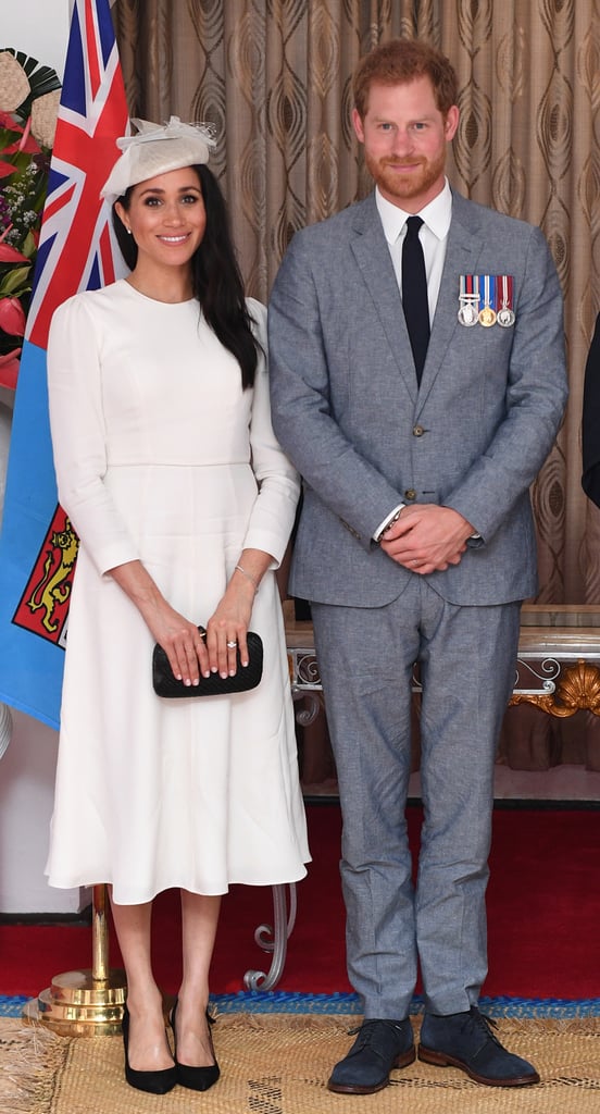 The Duchess of Sussex reused the same clutch while in Fiji. This time around, she wore it with a custom Zimmermann dress, a matching hat by Stephen Jones Millinery, and Tabitha Simmons pumps.