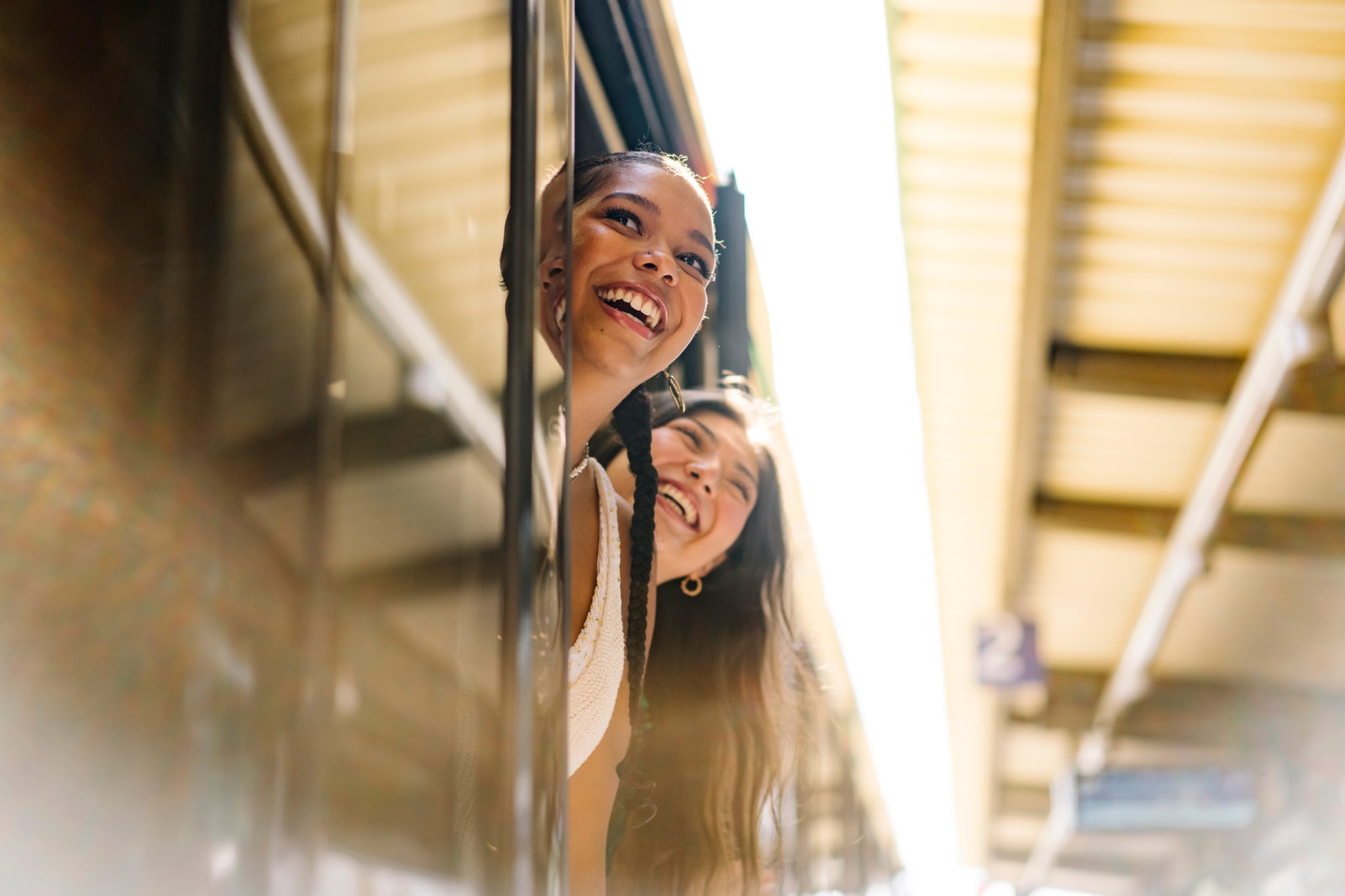 two friends traveling on a train
