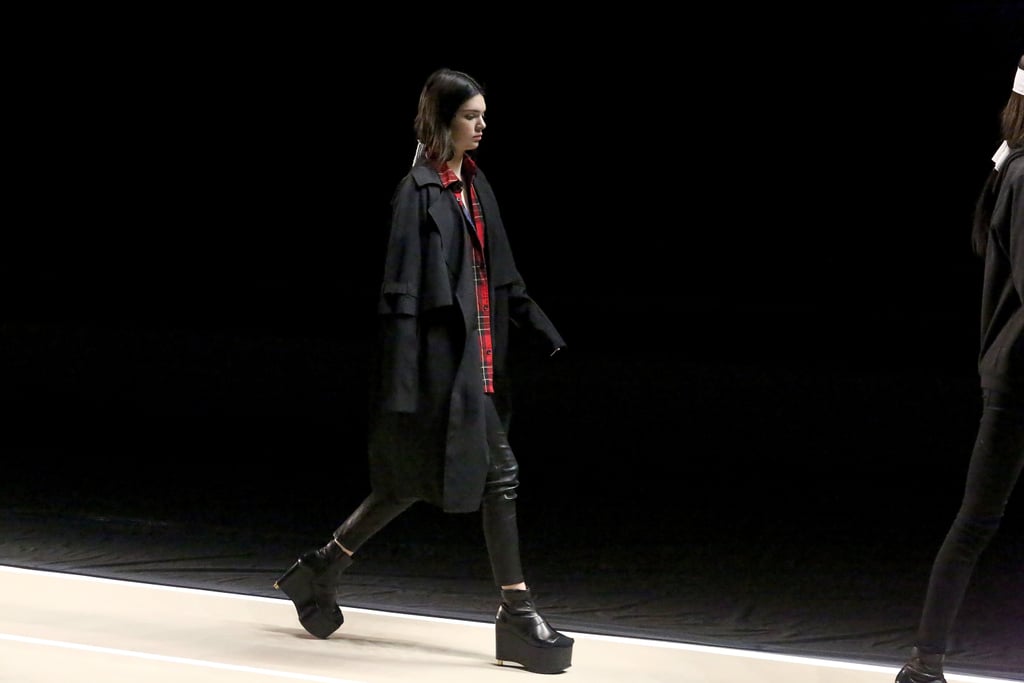 And Managed to Strut Her Stuff in Black Platforms