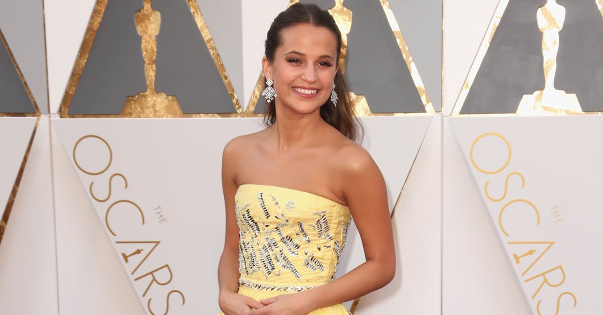 Alicia Vikander on stage at the 2016 Oscars wearing Louis Vuitton, Louis  Vuitton LV Trainer Grey Sneaker
