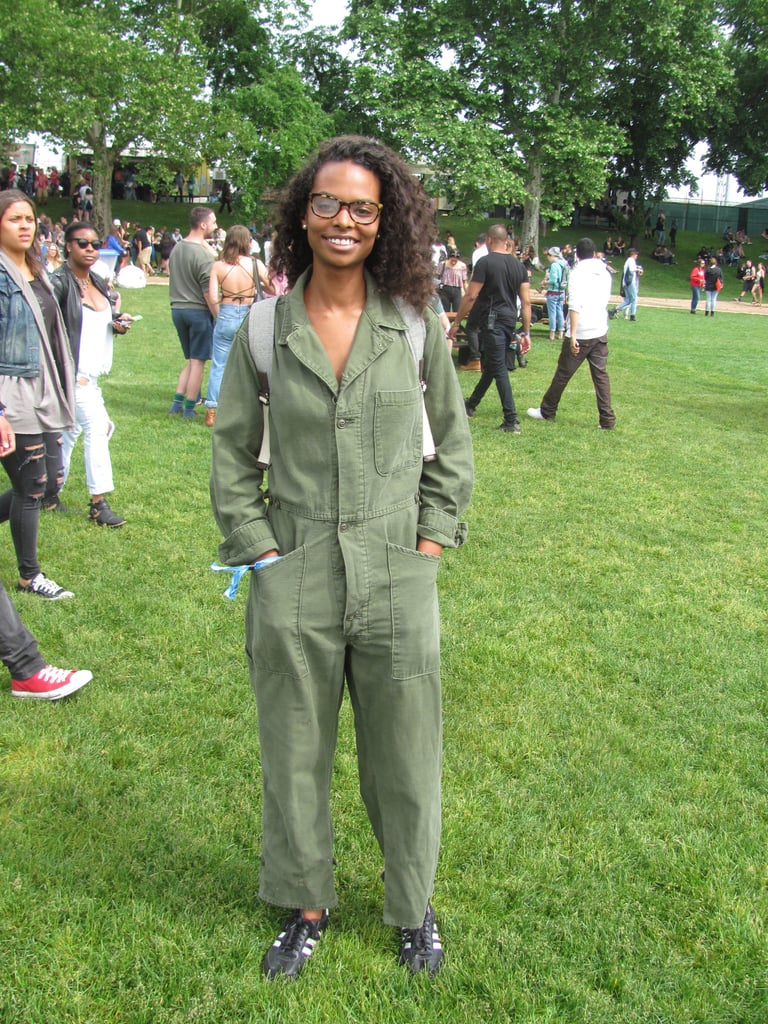 A practical jumpsuit paired with trendy Adidas sneakers were a combination that had this festivalgoer ready for anything.