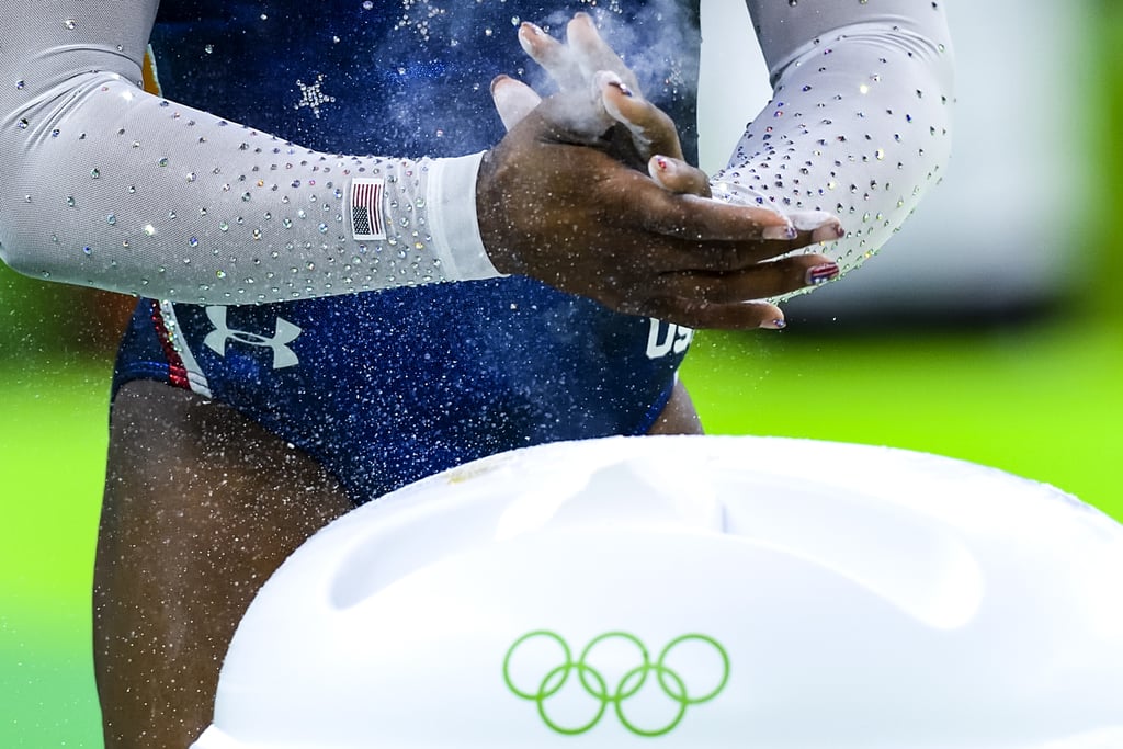 Why Gymnasts Use Chalk on Their Hands, Feet, and Legs POPSUGAR Fitness