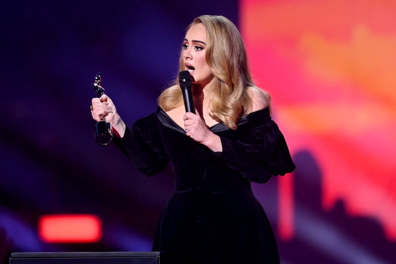 LONDON, ENGLAND - FEBRUARY 08: EDITORIAL USE ONLY  Adele receives the award for Artist of the Year during The BRIT Awards 2022 at The O2 Arena on February 08, 2022 in London, England. (Photo by Dave J Hogan/Getty Images for BRIT Awards Limited)