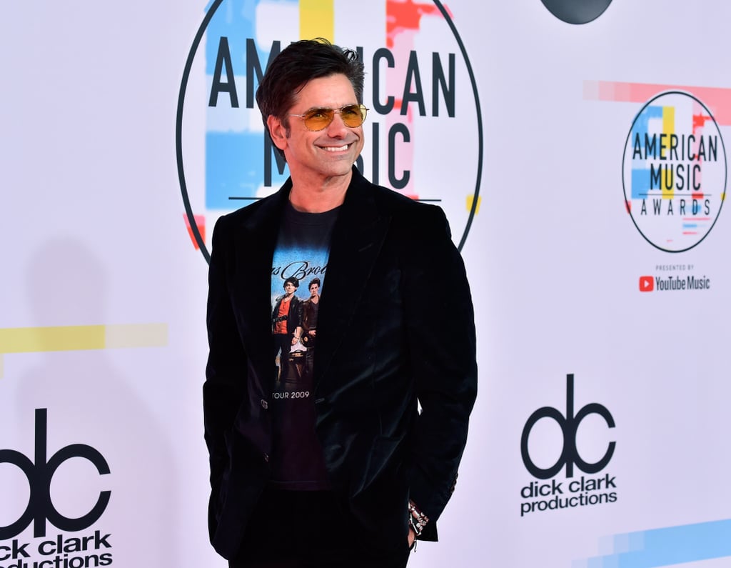 John Stamos Wearing Jonas Brothers T-Shirt at 2018 AMAs