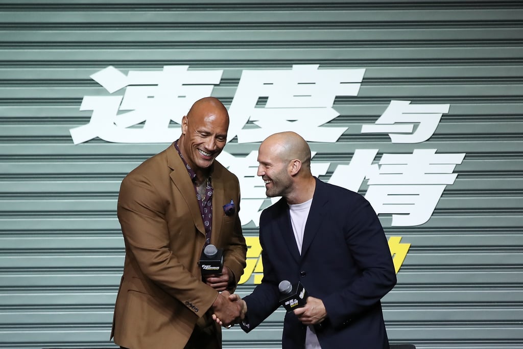 Dwayne Johnson and Jason Statham shook hands at a Hobbs & Shaw press panel in China in August 2019.