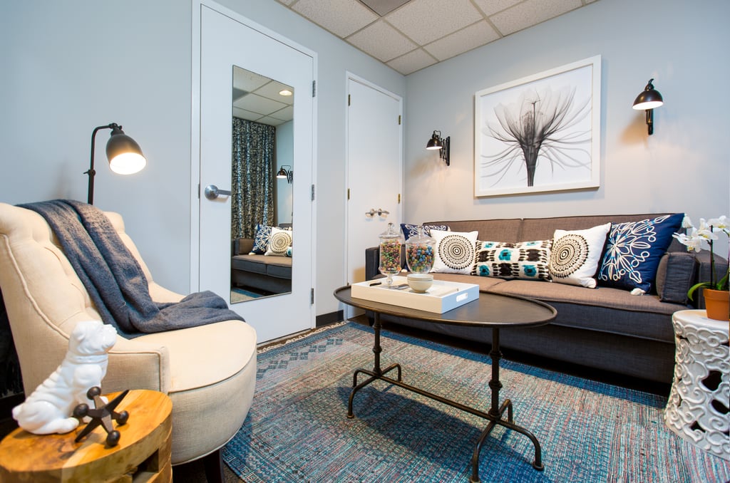 The steel coffee table is James's favorite piece of decor in the dressing room. "It's a little bit taller than a standard coffee table, which makes it easier if Erin or any of her guests are eating/drinking while relaxing in the space."