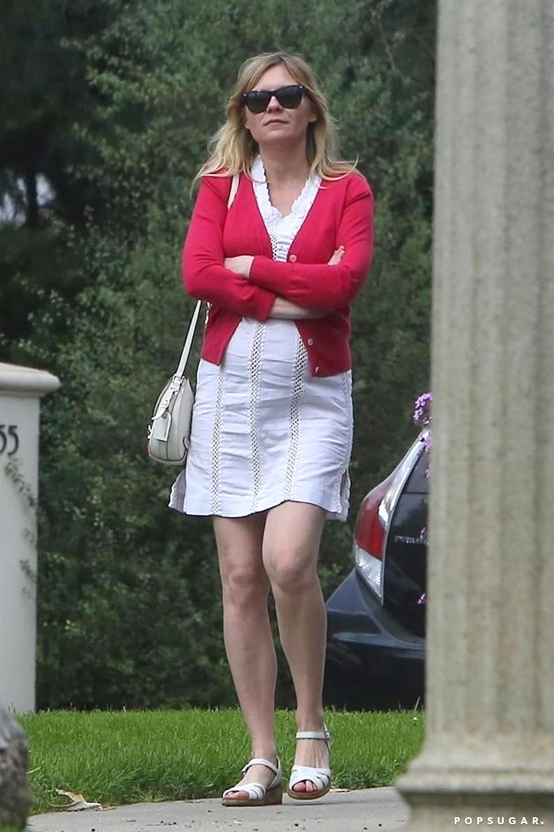 Looking Preppy in a White, Eyelet-Trimmed Dress and Pink Cardigan