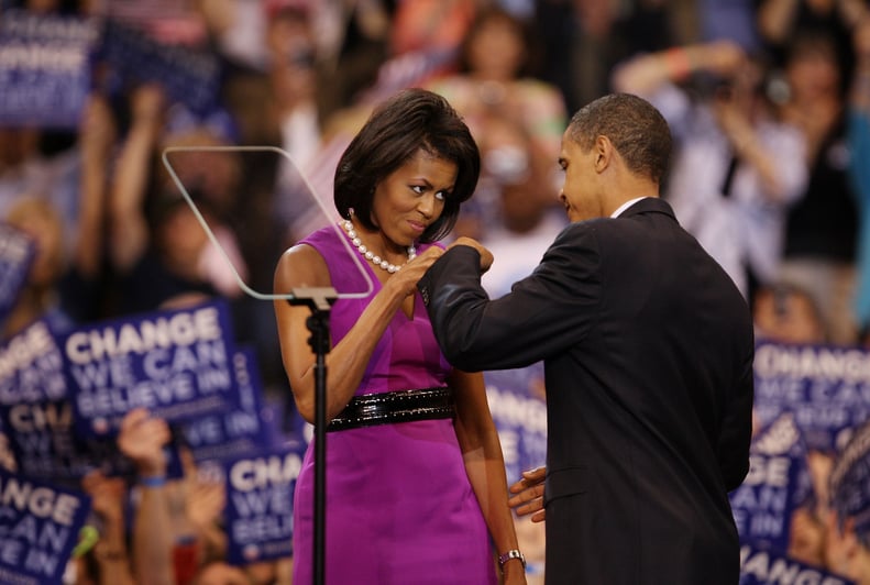 Fist bumping her husband at a campaign rally in 2008.
