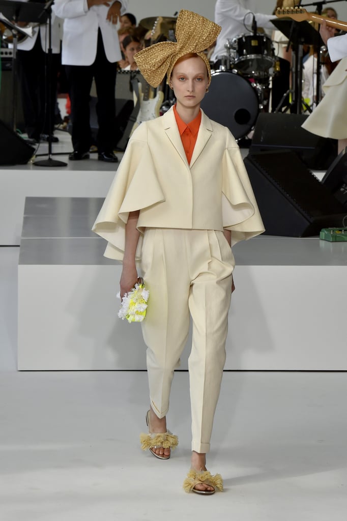 Since Michelle favors Delpozo's whimsical silhouettes, we can see her wearing this caped blazer from the fashion label.