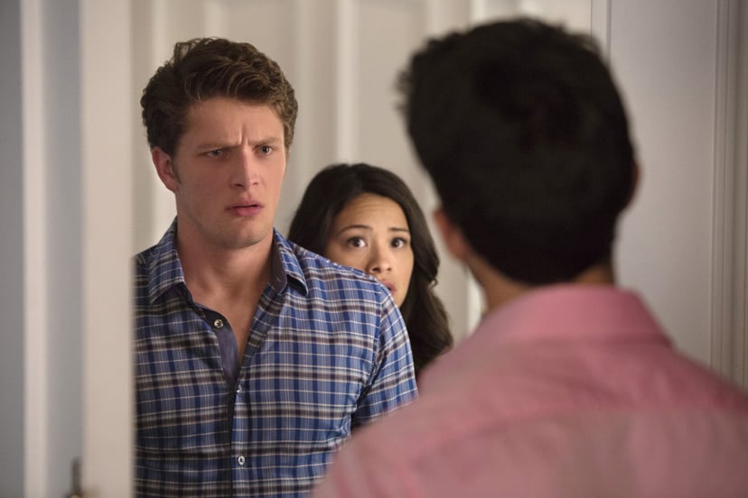JANE THE VIRGIN, (from left): Brett Dier, Gina Rodriguez, Justin Baldoni (back to camera), 'Chapter Fourteen', (Season 1, ep. 114, aired February 9, 2015). photo: Adam Rose / The CW / courtesy Everett Collection