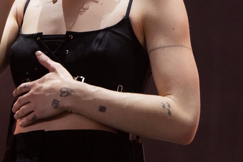 Phoebe Bridgers's Eyes Arm Tattoo