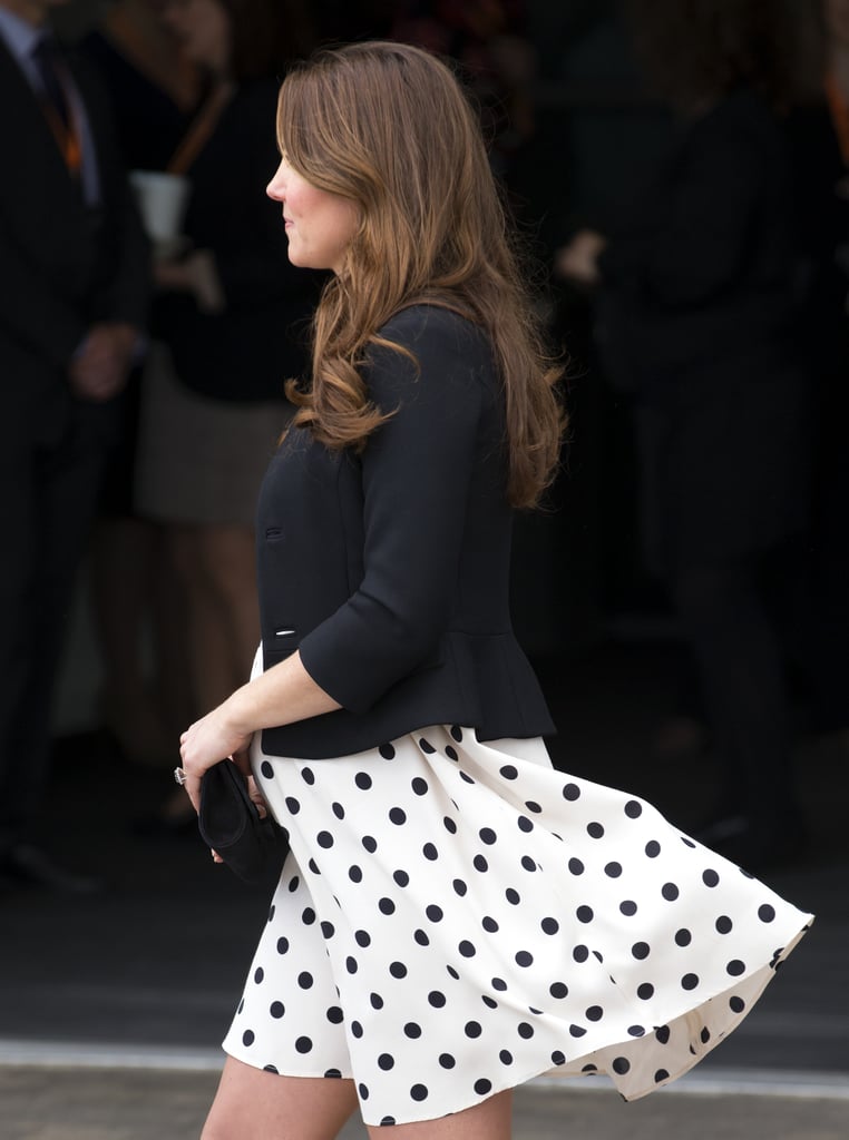 Back in April 2013 when she was pregnant with Prince George, the polka-dot Topshop dress Kate wore flew up a bit in the back — but she played it cool.