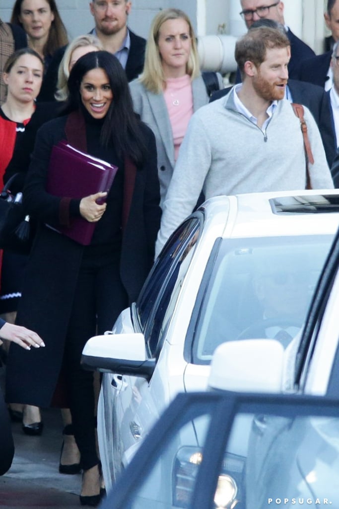 Meghan Markle's Black Coat With Maroon Trim October 2018