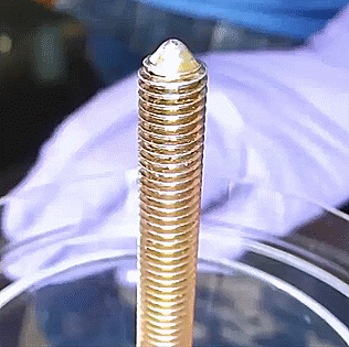 This screw topped with ferrofluid