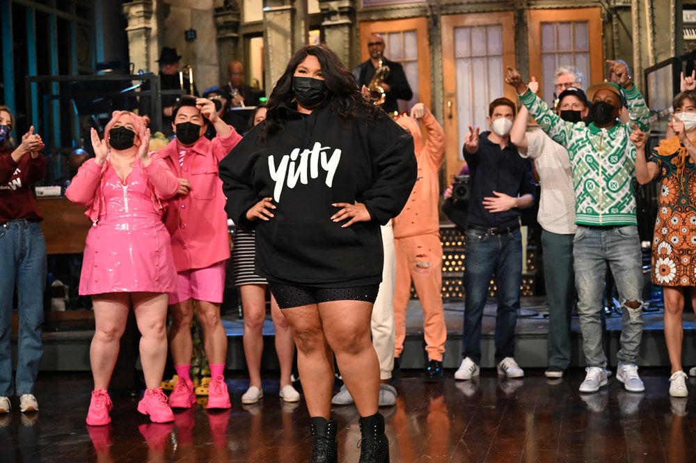 Lizzo's Casual Yitty Hoodie and Miniskirt on "SNL"