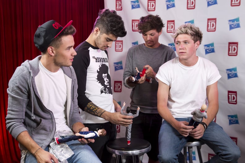 One Direction With Their One Direction Dolls in LA in 2013