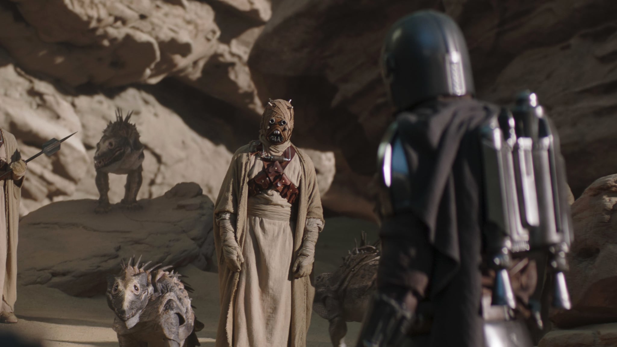 THE MANDALORIAN, from left: Tusken Raider, Pedro Pascal (back to camera - as the Mandalorian), 'Chapter 9: The Marshal', (Season 2, ep. 201, aired Oct. 30, 2020). photo: Disney+/Lucasfilm / Courtesy Everett Collection