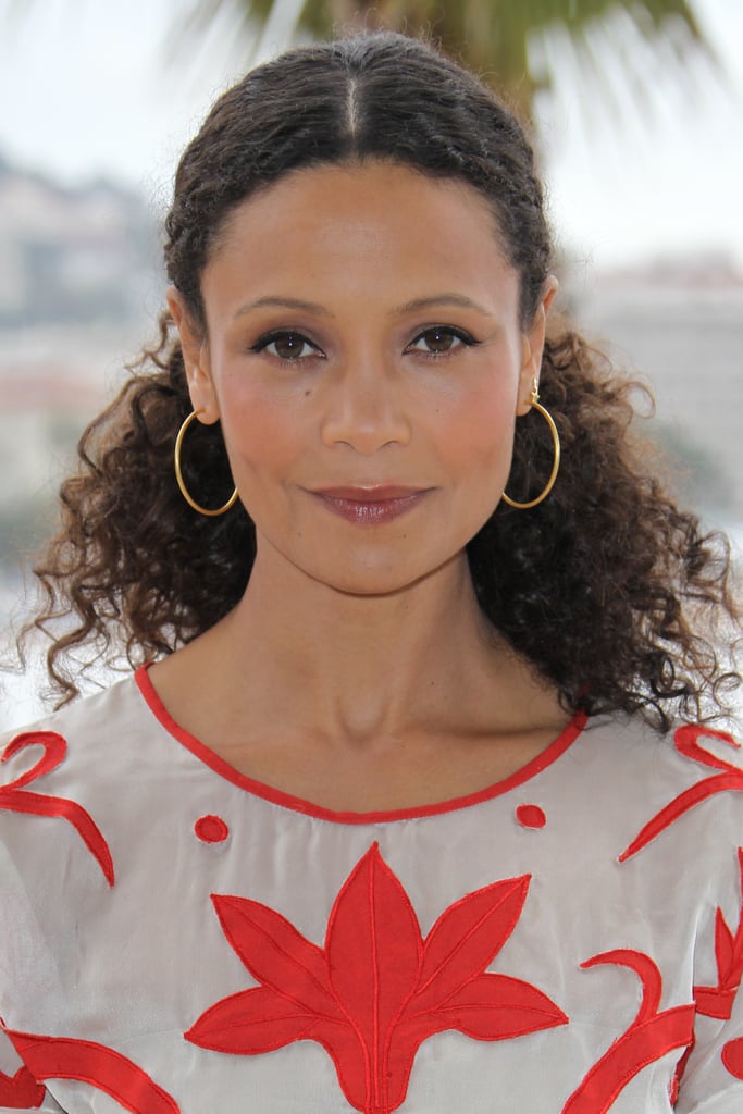 Women with curly hair sometimes have too much hair to fit in one rubberband. Take a note from Thandie Newton's style book and use bobby pins to secure hair behind the ears in a faux ponytail.