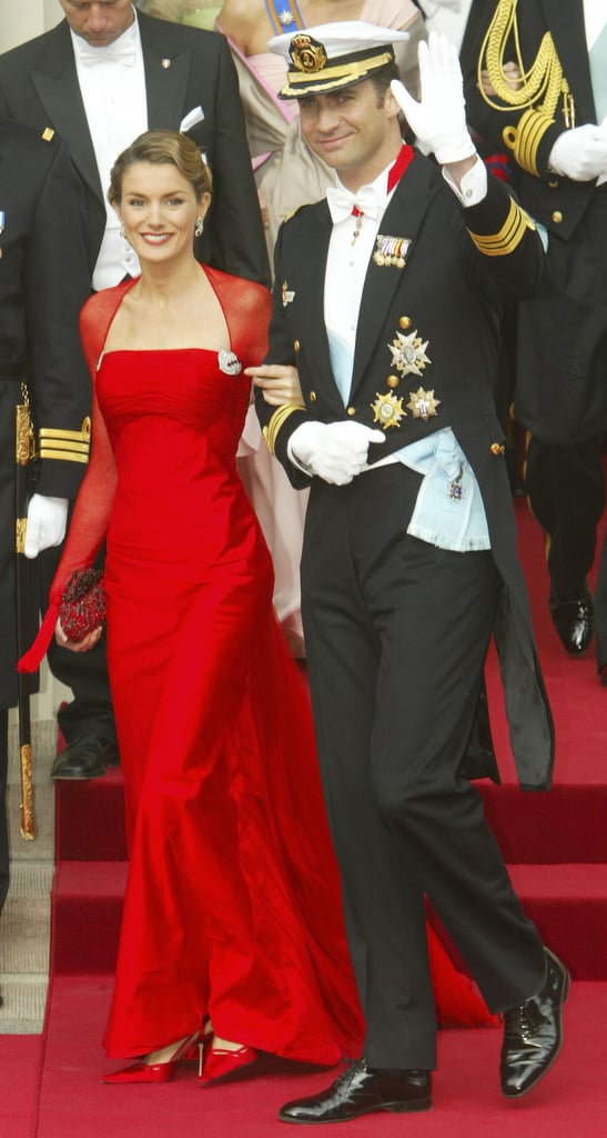 A Fitted Scarlett Gown With Sheer Sleeves From Lorenzo Caprile