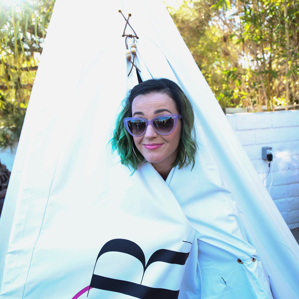 Katy Perry wrapped up in a tent.