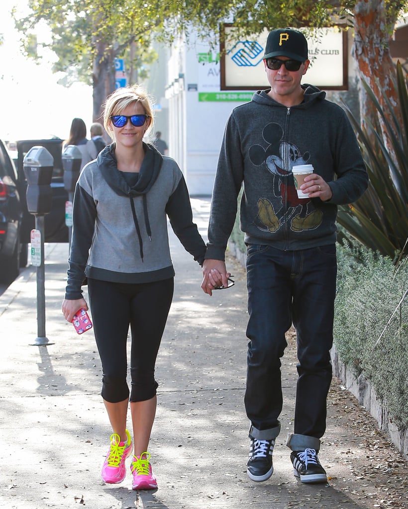 Reese Witherspoon and Jim Toth showed sweet PDA during their walk in LA on Friday.