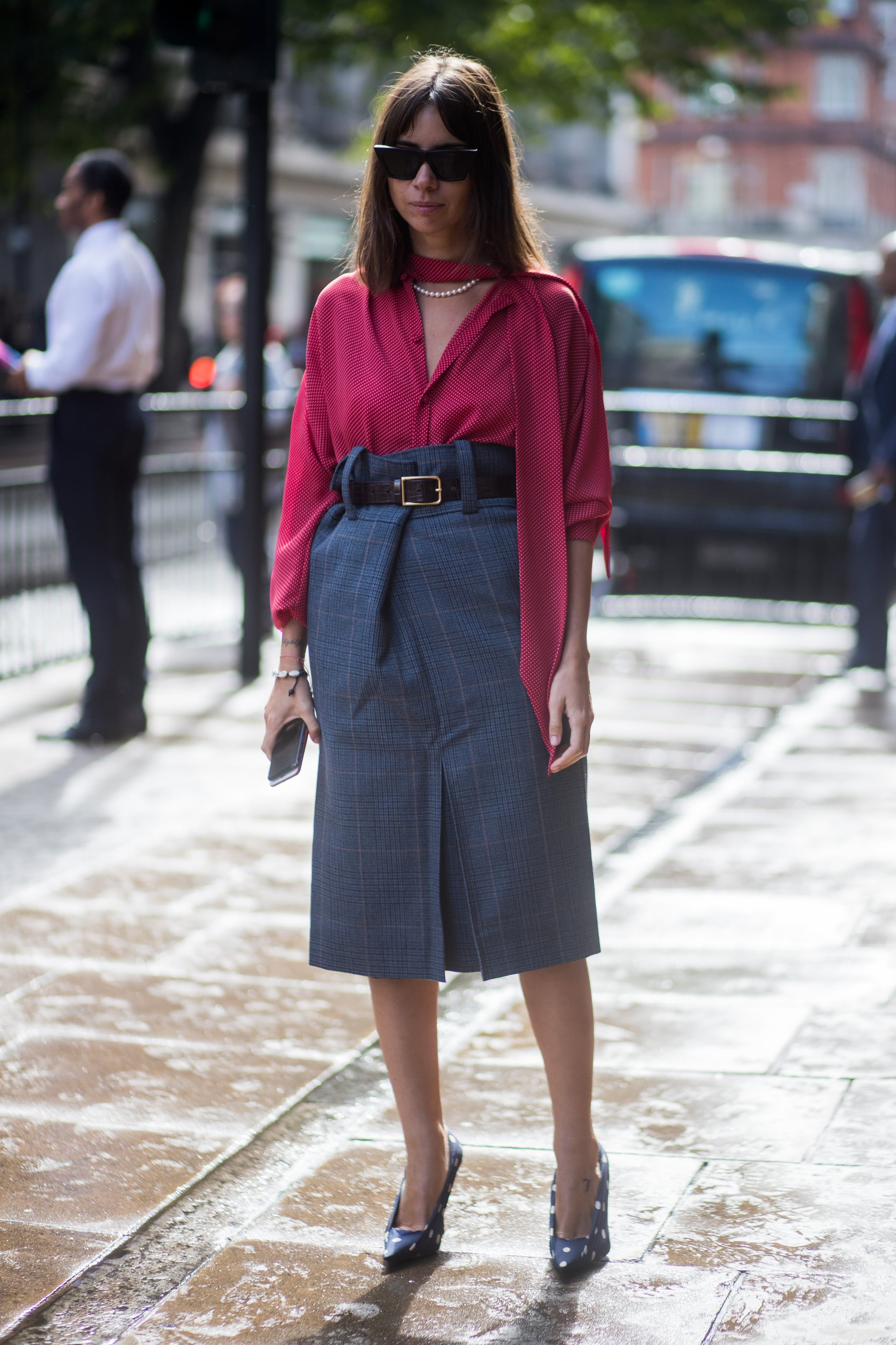 Fully Tucked in a High-Waisted Skirt With Neck Ties Creating Length, 31  Chic Ways to Style and Tuck Your Favourite Shirt This Spring