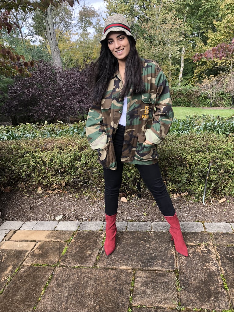 The outfit: I styled a vintage Gucci hat from What Goes Around Comes Around ($650) with a camo jacket, black Frame jeans, and my red suede Stuart Weitzman Clinger Boots ($460, originally $575) to match the red stripe in my hat.