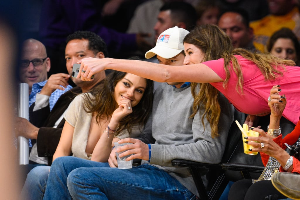 Mila Kunis and Ashton Kutcher at Lakers Game Dec. 2014