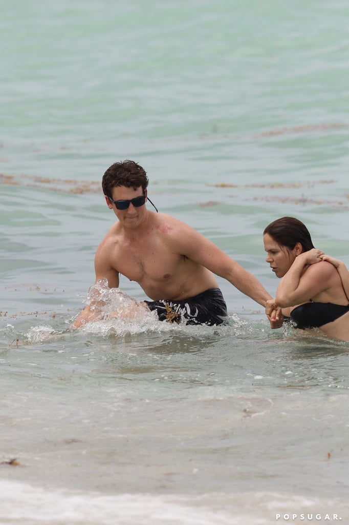 Miles Teller and His Girlfriend on the Beach in Miami
