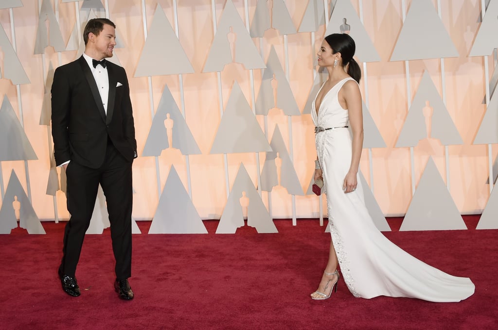 Channing smiled at his gorgeous wife as she struck some poses on her own on the Oscars red carpet in February 2015.