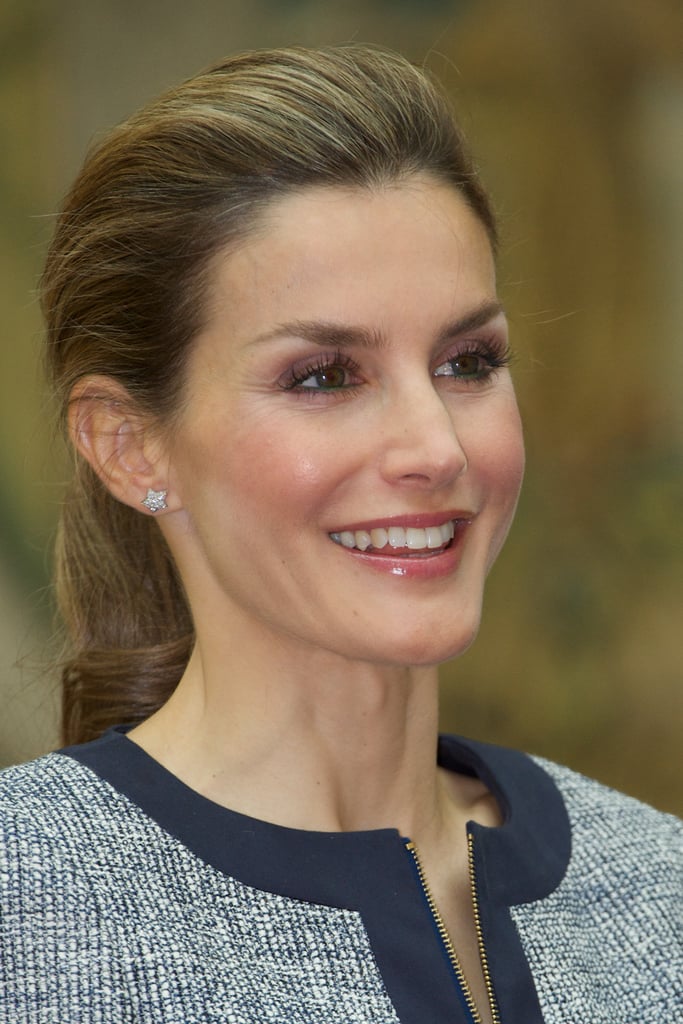 In June 2013, Letizia flashed a smile while holding an audience in Madrid.