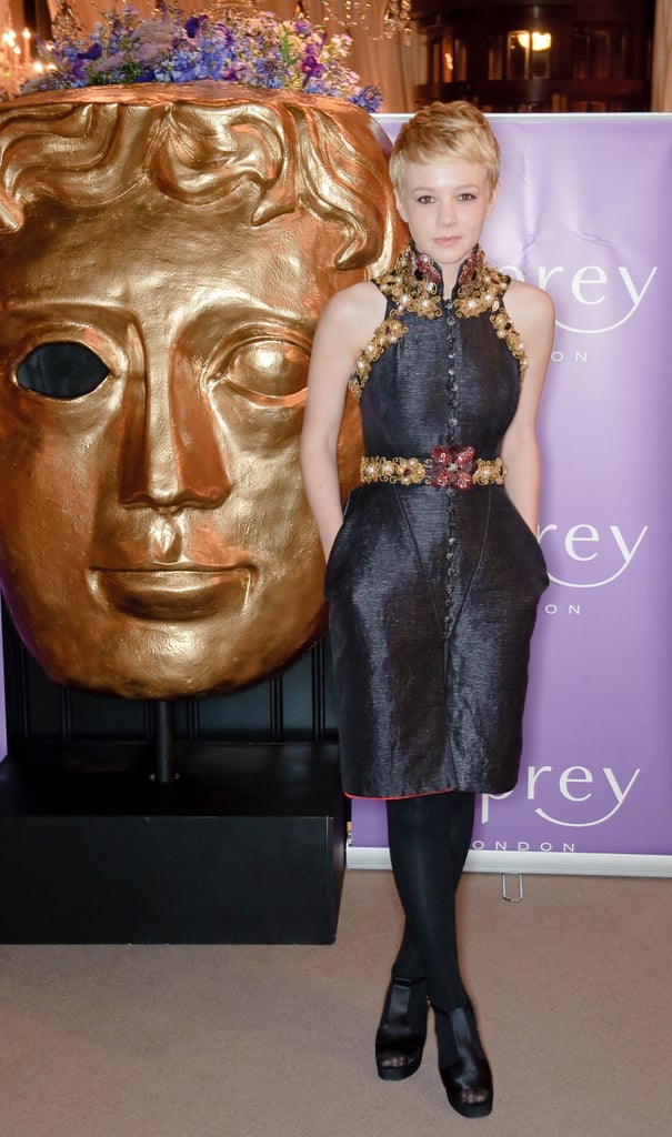 Carey stepped out of her poised comfort zone and toed the futuristic fashion line in a textured Chanel creation, complete with gold and ruby embellishments, at the BAFTAs in London. Carey stepped out of her poised comfort zone and toed the futuristic fashion line in a textured Chanel creation, complete with gold and ruby embellishments, at the BAFTAs in London.